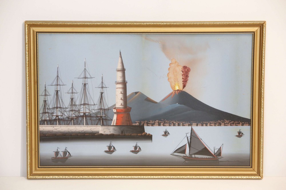 A pair of framed 19th-century gouache paintings depicting maritime scenes with sailing ships, a harbour lighthouse, and Mount Vesuvius in gilt frames. View V