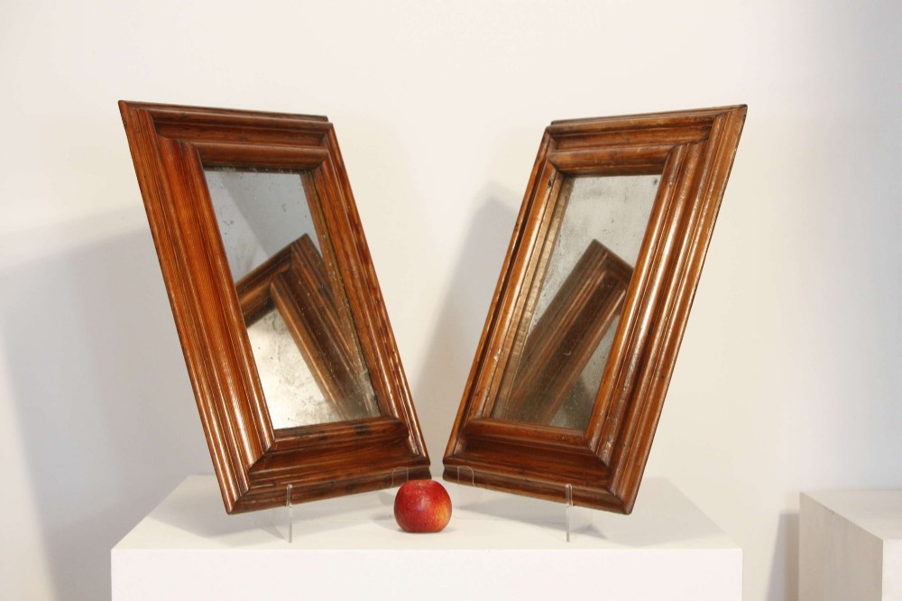A pair of matching rectangular wall mirrors with deep moulded pine frames and distressed glass plates. View X