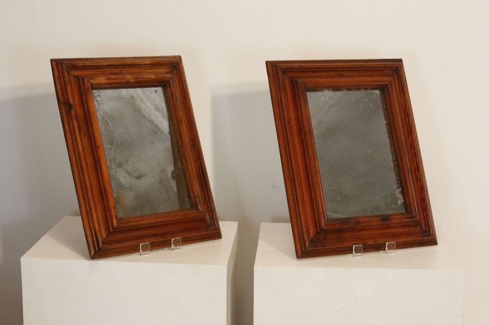 A pair of matching rectangular wall mirrors with deep moulded pine frames and distressed glass plates. View XII