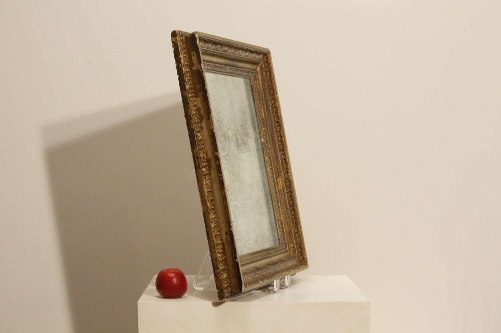 A 19th-century French rectangular giltwood wall mirror featuring a moulded frame with detailed borders and a heavily foxed glass plate. View III