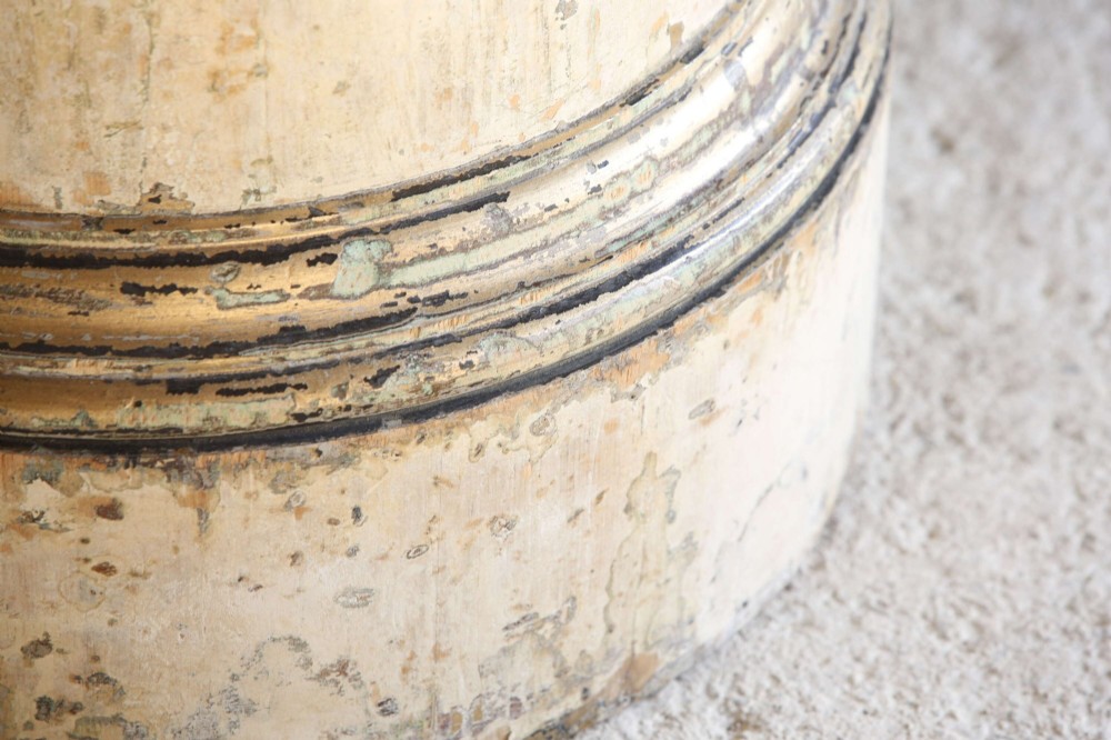 A cylindrical 18th-century Neoclassical painted pine column pedestal with a stepped moulded base and a weathered cream paint finish. View VII