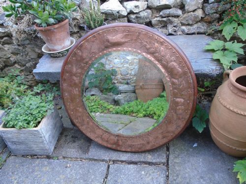 Stunning large Arts & Crafts copper mirror