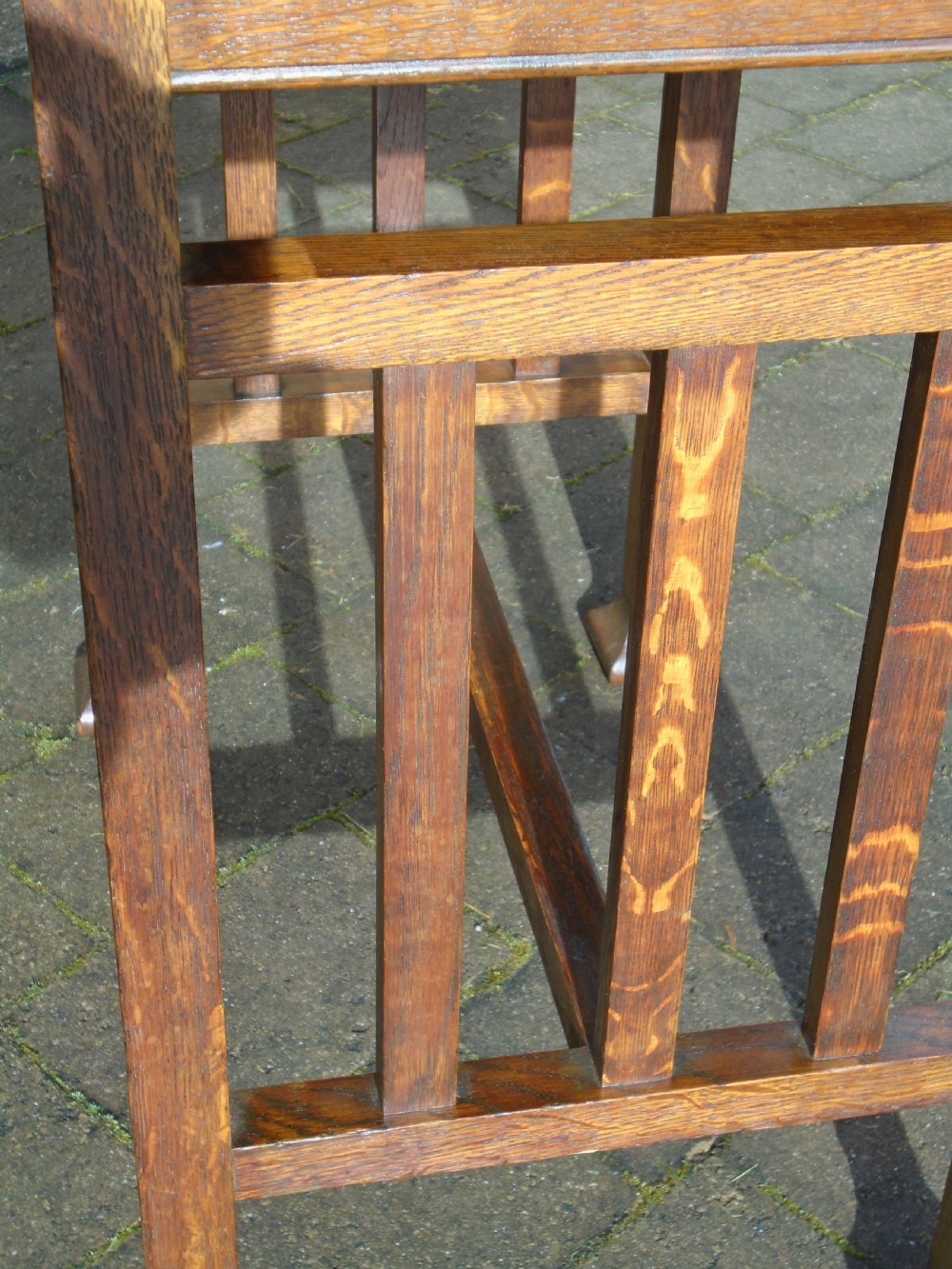 A rectangular Arts and Crafts oak side table featuring slatted side stretchers, square legs with splayed feet, and a flat top. View VII