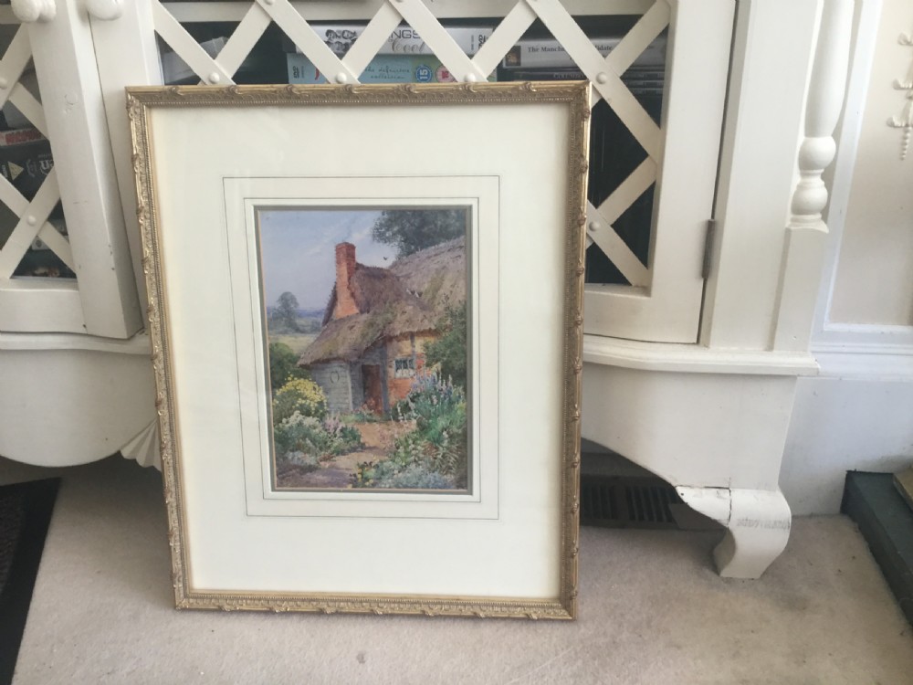 A watercolour painting depicting a thatched roof cottage with a brick chimney and a garden filled with yellow and purple flowers. View IV