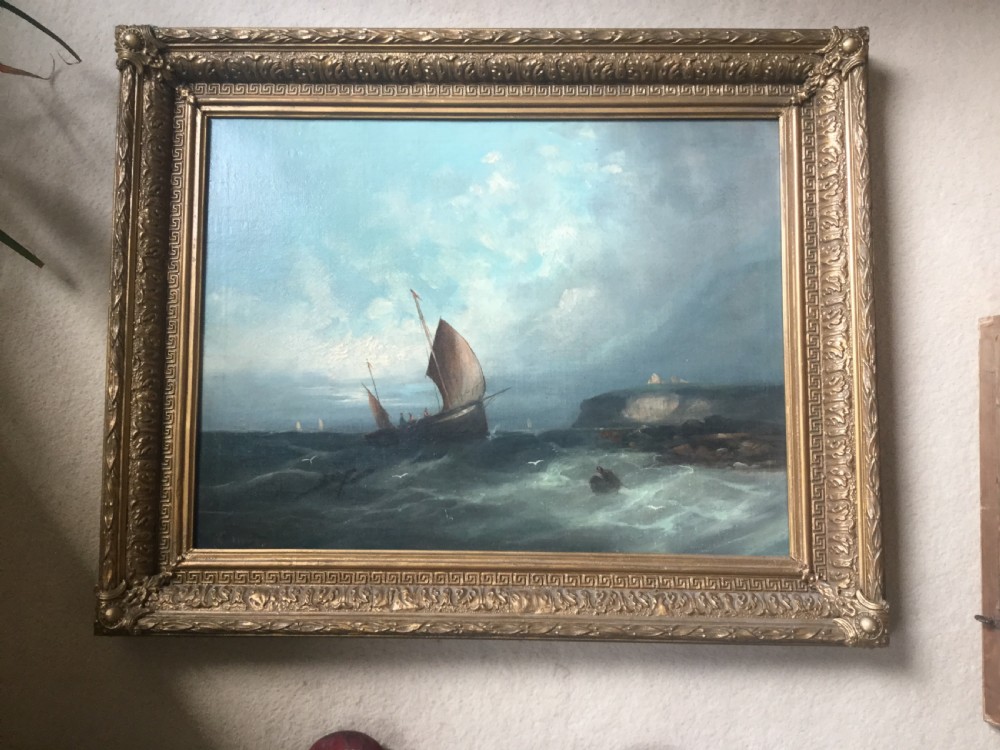 An Edwardian watercolour painting depicting a tall-masted sailing ship navigating choppy grey seas alongside a steamship under a overcast sky, signed W. Boyce and dated 1906. View III