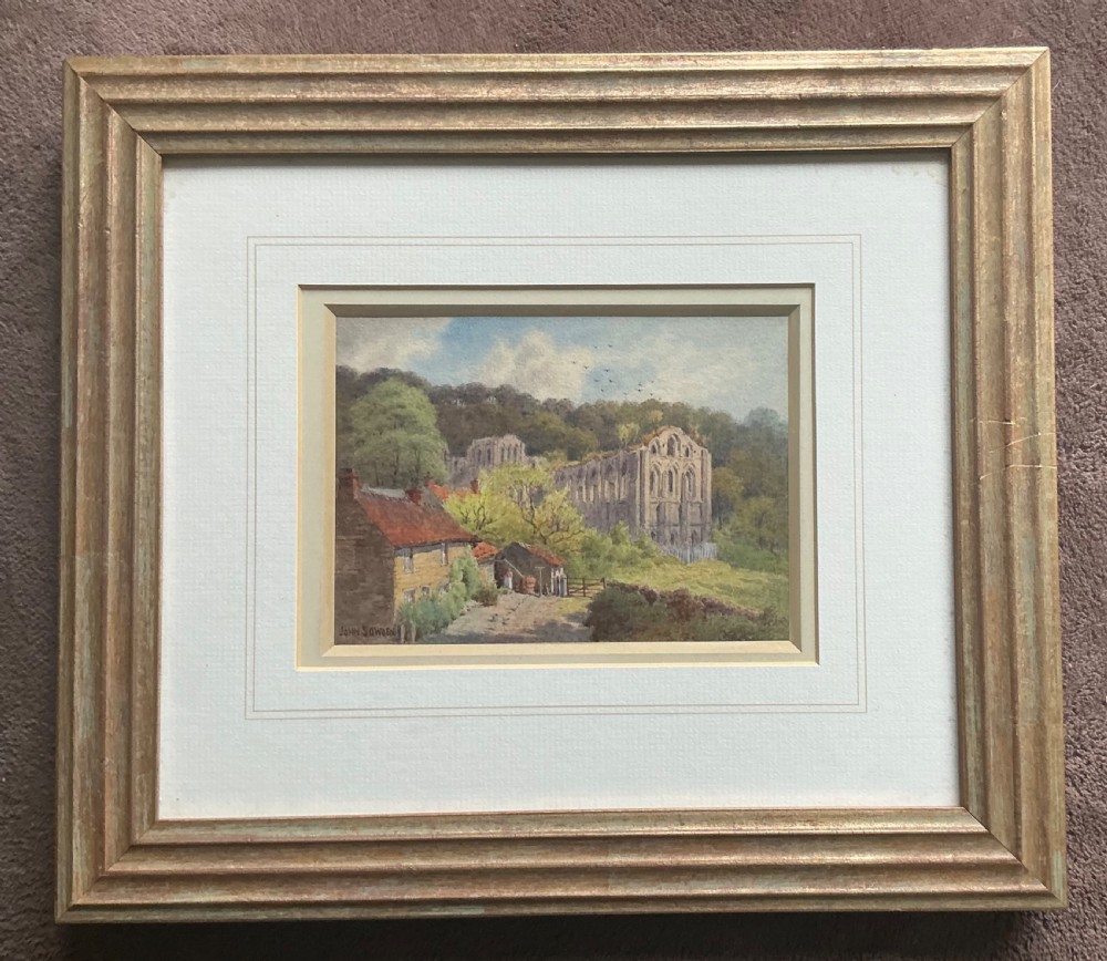 A watercolour painting depicting the stone ruins of Rievaulx Abbey behind cottage buildings in a green Yorkshire landscape. View III