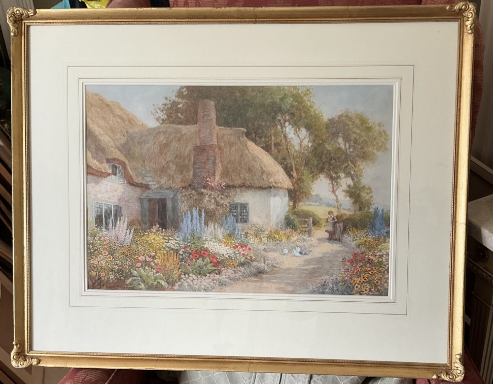 ARTHUR CLAUDE STRACHAN WATERCOLOUR ‘GIRL IN THE GARDEN OF A THATCHED COTTAGE ‘ View II