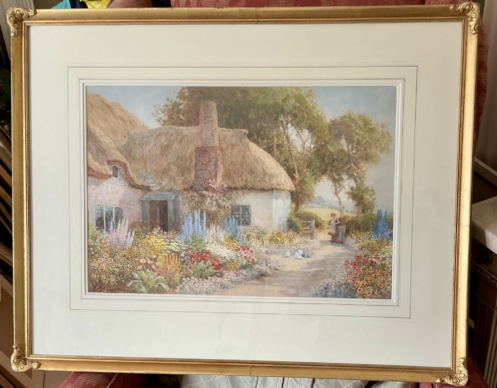 ARTHUR CLAUDE STRACHAN WATERCOLOUR ‘GIRL IN THE GARDEN OF A THATCHED COTTAGE ‘ View III