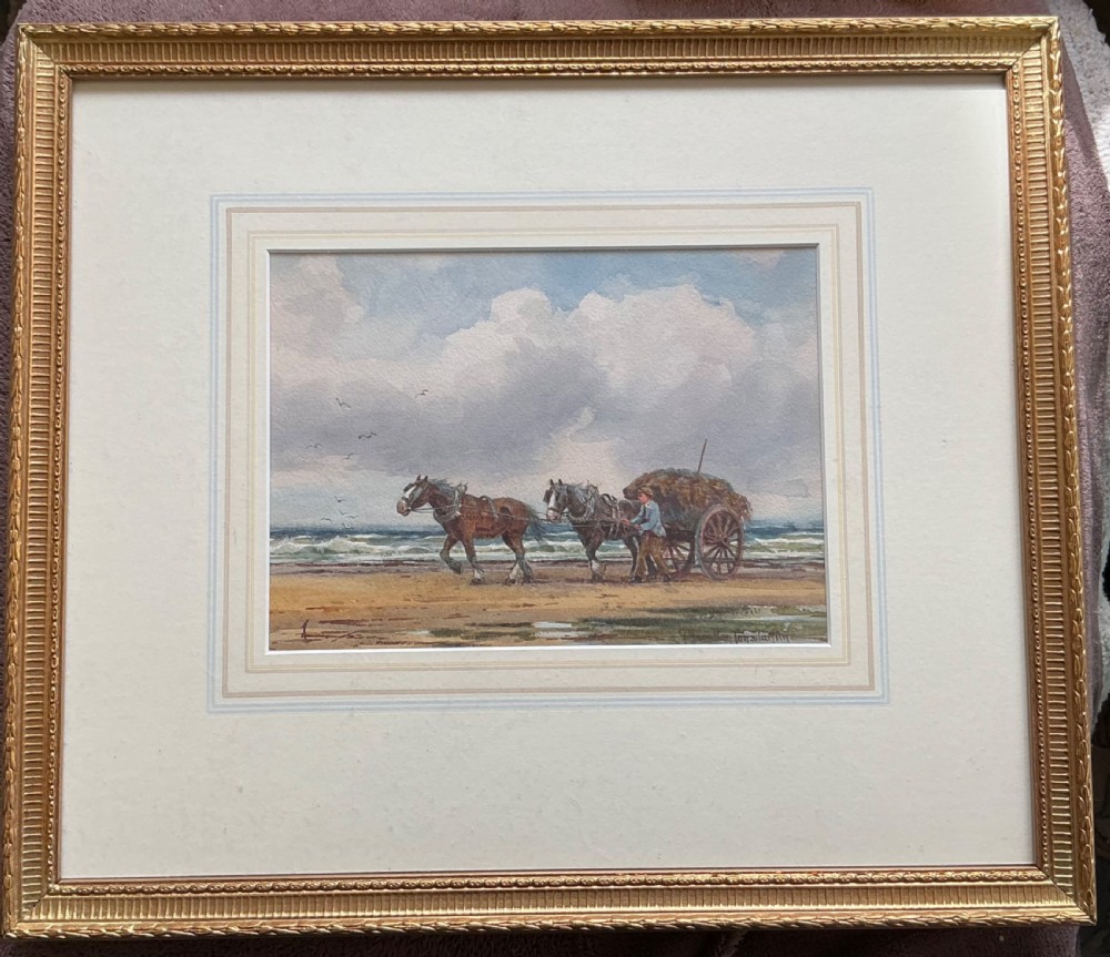 A watercolour painting depicting two heavy horses pulling a cart laden with seaweed along a sandy beach accompanied by a figure under a cloudy sky. View II
