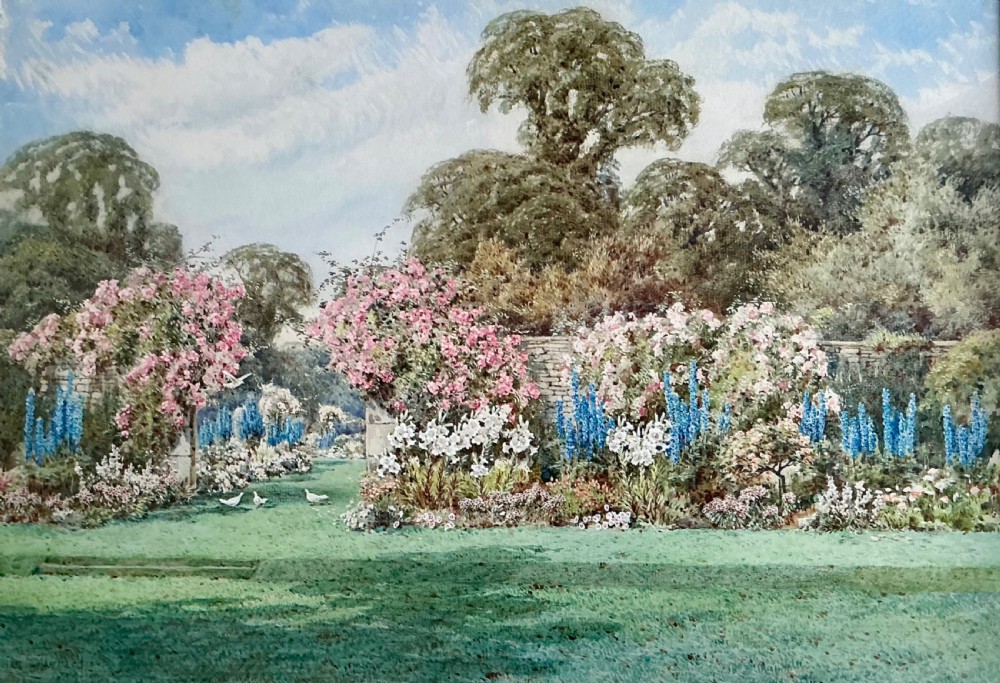 An antique watercolour painting depicting a summer walled garden with pink climbing roses, white lilies, blue delphiniums, and background trees.