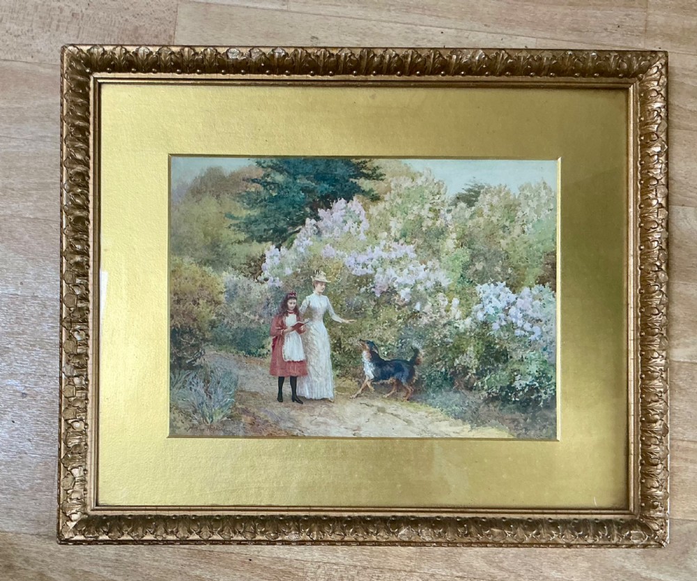 A Victorian watercolour painting showing a woman in white and a girl in red with a dog along a garden path lined with purple lilac bushes. View V