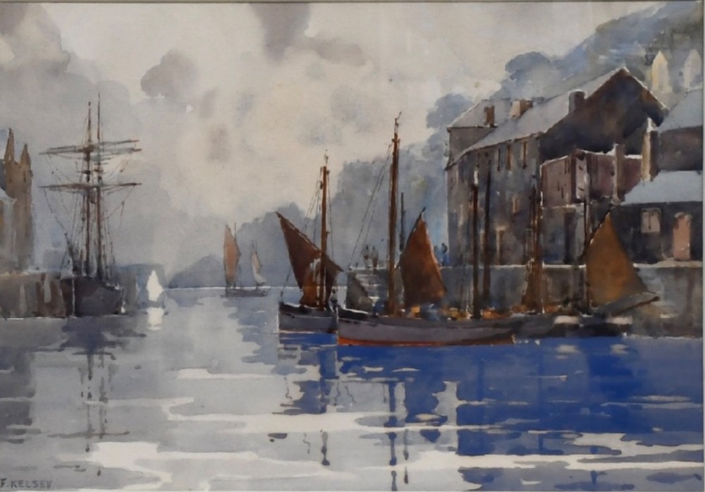 A framed watercolour painting depicting sailing vessels and stone harbour buildings under a cloudy sky in Looe, Cornwall.