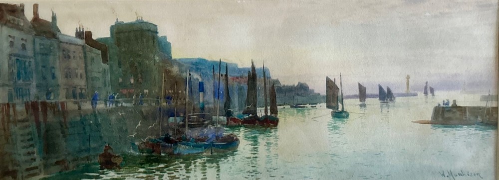 A watercolour painting depicting sailing boats in Whitby harbour against a backdrop of historic town buildings and a muted sky.