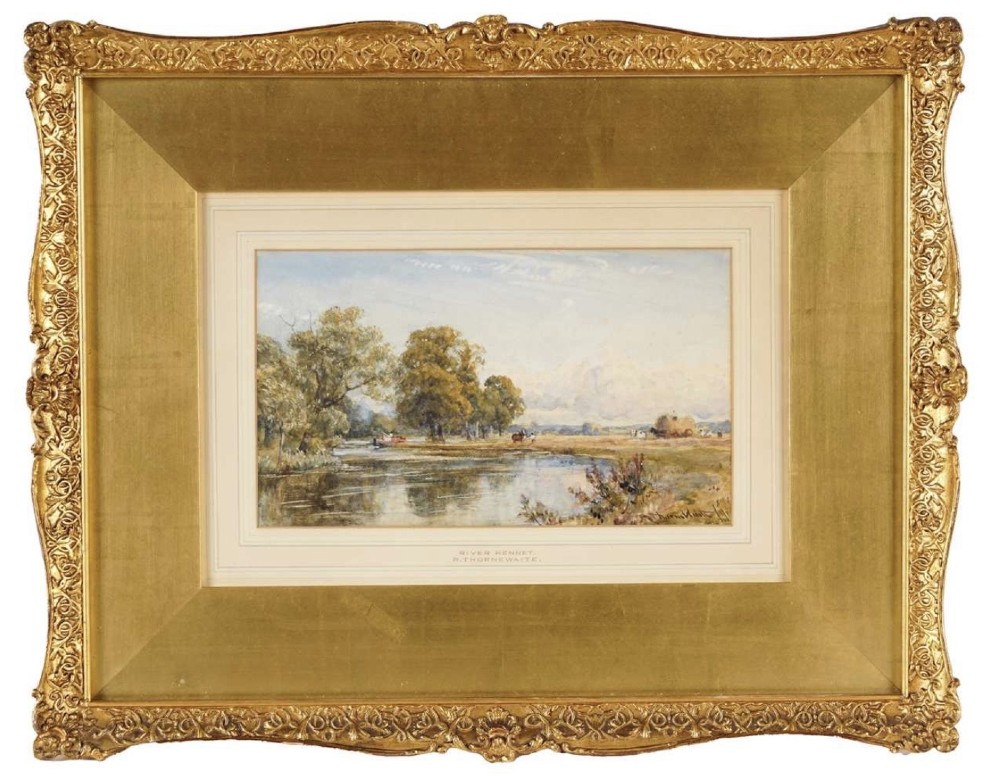 A framed Victorian watercolour painting depicting a tranquil river landscape with trees and figures, set within an ornate gilded frame.
