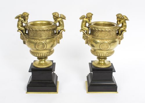 Antique Pair of French Gilt Bronze Urns Flanked by Cherubs 19th C
