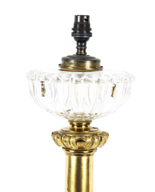 fig 3. An antique William IV gilt bronze table lamp featuring a column base with carved acanthus foliage and a cut glass bowl below the fitting.