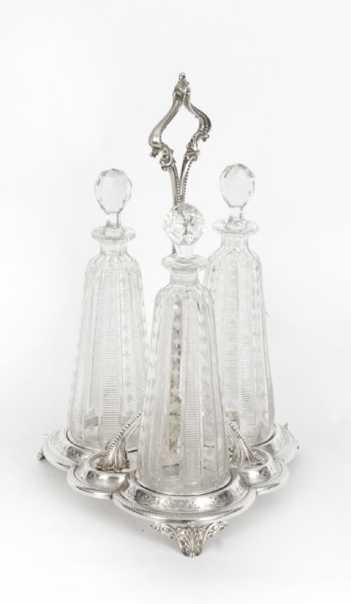 fig 1. Antique Victorian Silver Plated Triple Decanter Tantalus Stand 19th C