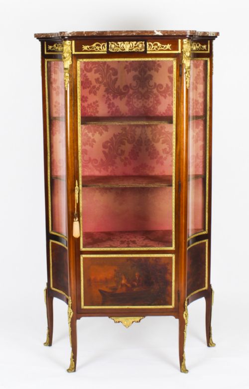 fig 1. A 19th-century French Vernis Martin glass display cabinet with painted lower panels, gilt-bronze mounts, cabriole legs, and a shaped marble top.