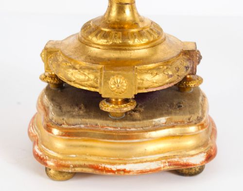 fig 6. A pair of 19th-century French Sevres-style bleu celeste porcelain urns featuring hand-painted floral and bird reserves, supported by gilt metal mounts and pedestals.