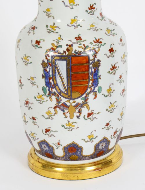 fig 2. A 19th-century French Samson porcelain table lamp featuring a hand-painted heraldic crest, floral sprigs, and gilt mounts.