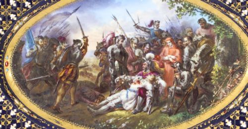 fig 1. An antique French oval porcelain dish featuring a central hand-painted historical battle scene surrounded by a cobalt blue border with gilt lattice work and portrait cartouches.
