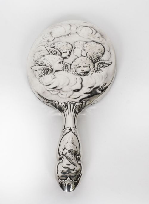 fig 1. Antique Sterling Silver Cherubs Hand Mirror 1905 William Comyns & Sons.