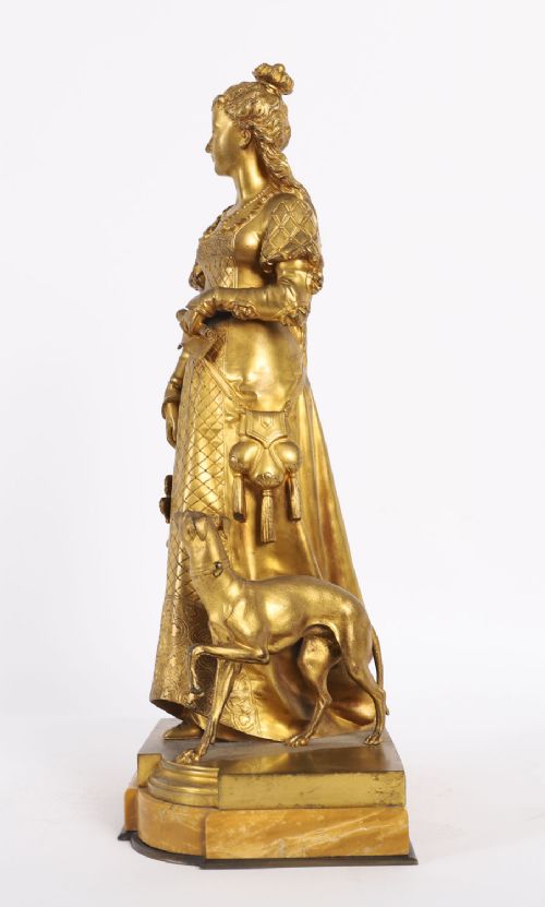 fig 3. A nineteenth-century gilt bronze sculpture depicting a noblewoman in a patterned gown holding a fan, standing next to a hound on a marble base.