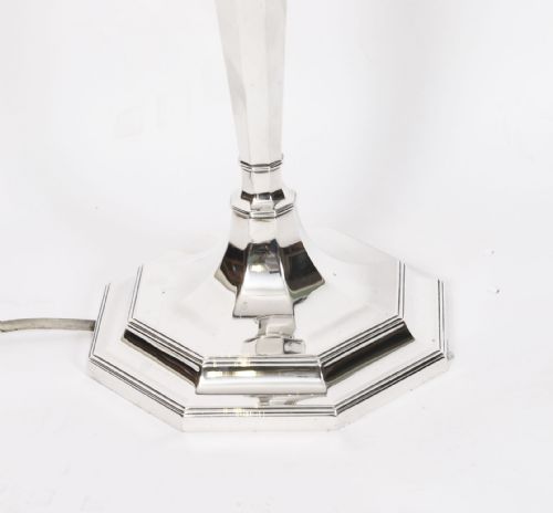 fig 2. An antique George V Art Deco sterling silver table lamp featuring a faceted octagonal column and stepped base.