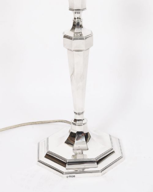 fig 3. An antique George V Art Deco sterling silver table lamp featuring a faceted octagonal column and stepped base.