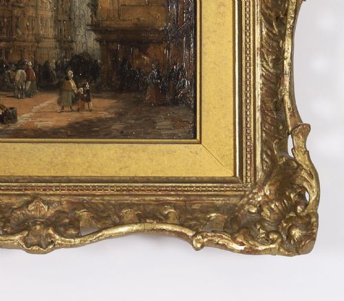 fig 2. A pair of 19th-century architectural oil paintings depicting European cathedral street scenes framed in heavy ornate gilded frames.