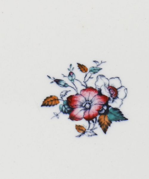 fig 4. A twenty-two piece antique Muller Volkstedt porcelain dinner service featuring white ground with floral borders, red rims, gold accents, including a large tureen, serving platters, and plates.