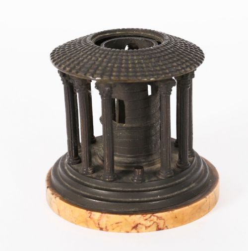 fig 1. A nineteenth-century dark bronze architectural model of the circular Temple of Hercules Victor featuring Corinthian columns and a tiled roof mounted on a marble base.