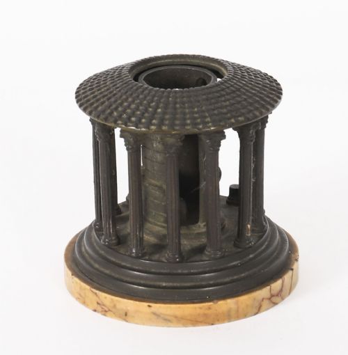 fig 2. A nineteenth-century dark bronze architectural model of the circular Temple of Hercules Victor featuring Corinthian columns and a tiled roof mounted on a marble base.