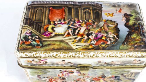fig 3. A rectangular 19th-century Capodimonte porcelain casket featuring relief-moulded classical figures, gilt brass mounts, and a hinged lid.