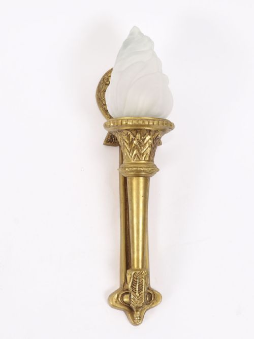 fig 1. Set of four Neo-Classical style wall lights crafted in gilt metal with flaming torch backplates and frosted glass flame-shaped shades.