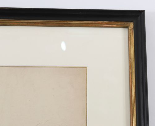 fig 3. A framed late 19th-century graphite drawing on cream paper depicting a male anatomical figural study with an raised arm, set within a black frame featuring a gold inner trim.