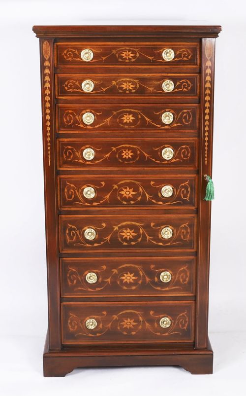 fig 1. An Edwardian mahogany Wellington chest featuring eight inlaid drawers, satinwood floral motifs, a right-side locking stile, and brass handles.