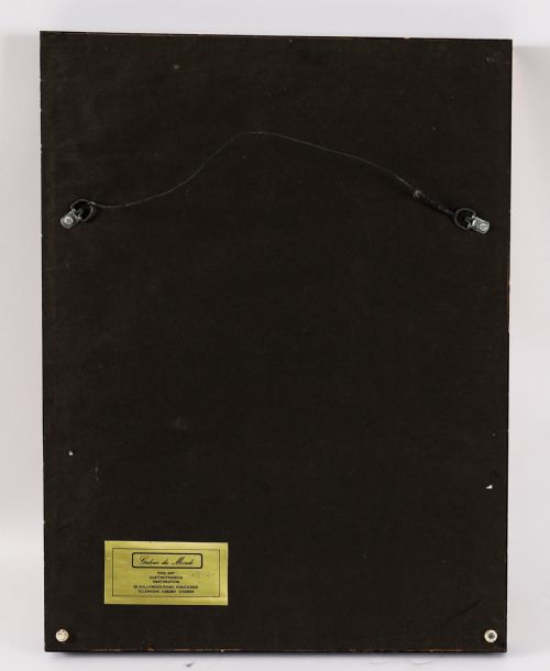 fig 7. A pair of dark velvet-lined gilt frames containing arrangements of white plaster classical intaglio cameos.