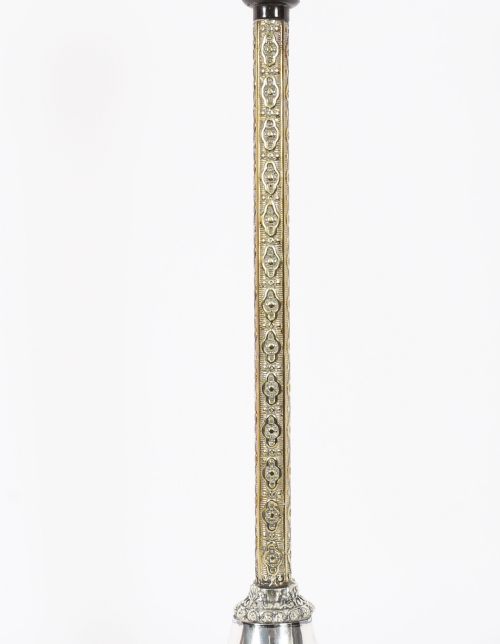 fig 5. A nineteenth-century silver-plated table lamp base with a parcel gilt patterned column and stepped circular foot.