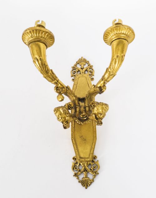 fig 1. A pair of antique French Louis XIV Revival two-branch gilt bronze ormolu wall sconces decorated with cherub motifs.