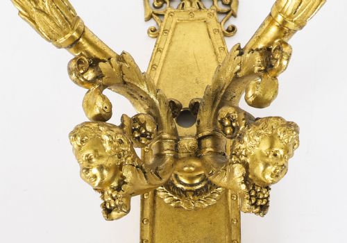 fig 4. A pair of antique French Louis XIV Revival two-branch gilt bronze ormolu wall sconces decorated with cherub motifs.