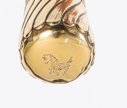 fig 2. A straight polished wooden walking cane featuring a decorated 18ct gold pommel handle and a metal ferrule tip at the base.