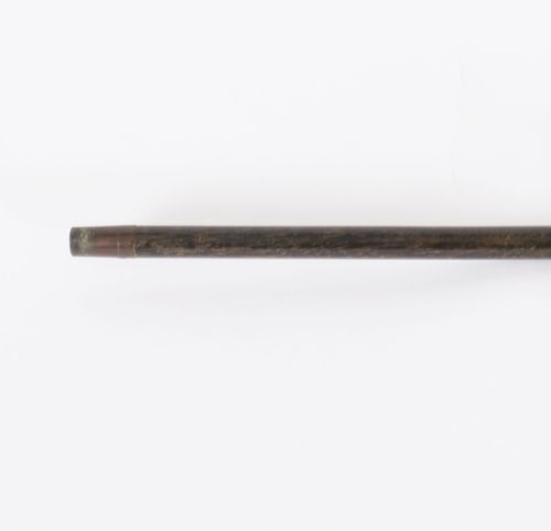 fig 5. An Edwardian walking cane featuring a spherical lapis lazuli pommel accented with a faceted crystal band and a ribbed gold collar on a dark hardwood shaft.