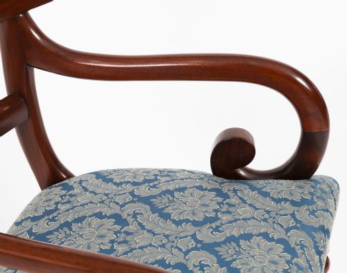 fig 4. A set of eight William IV mahogany barback dining chairs with blue damask patterned fabric upholstery and turned front legs.