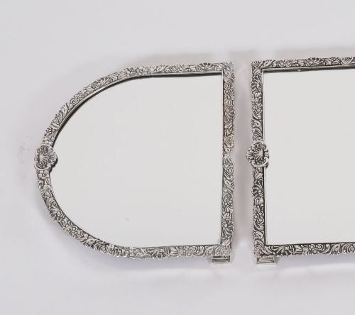 fig 3. A three-piece antique French silver-plated mirrored surtout de table with ornate floral and shell border mouldings.