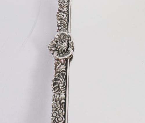 fig 7. A three-piece antique French silver-plated mirrored surtout de table with ornate floral and shell border mouldings.