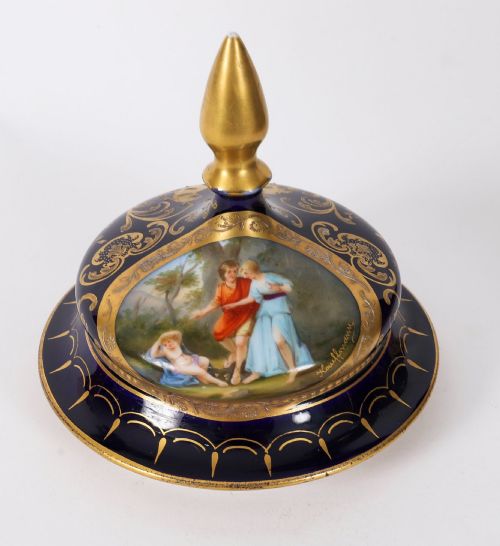 fig 9. A pair of large 19th-century cobalt blue porcelain vases on matching square pedestals, featuring gilt scrollwork and hand-painted classical mythological scenes.