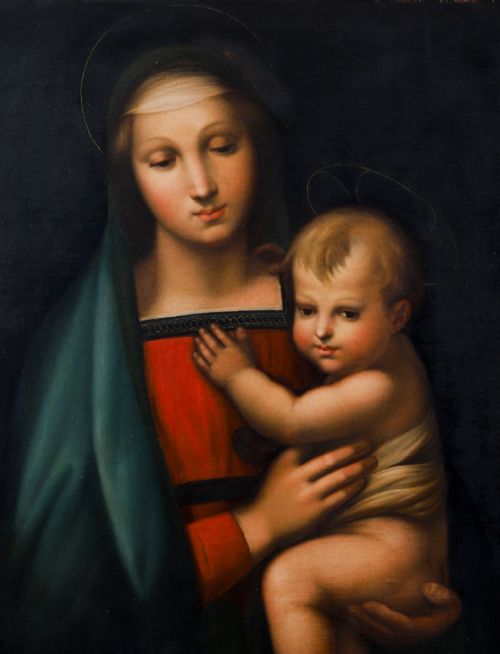 fig 3. An early 19th-century oil painting depicting the Virgin Mary holding the infant Christ, framed in an ornate carved gold leaf frame.