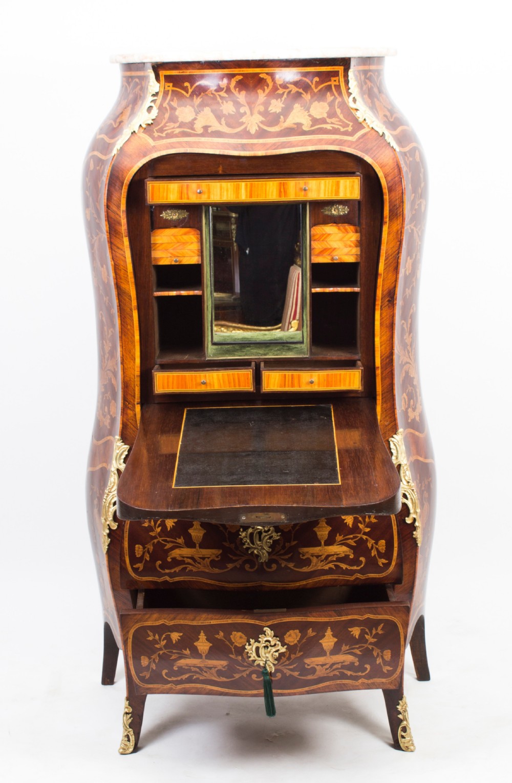 A 19th-century French Rococo Revival secretaire a abattant crafted with floral marquetry, gilt bronze mounts, a contoured silhouette, and a marble top. View XIII