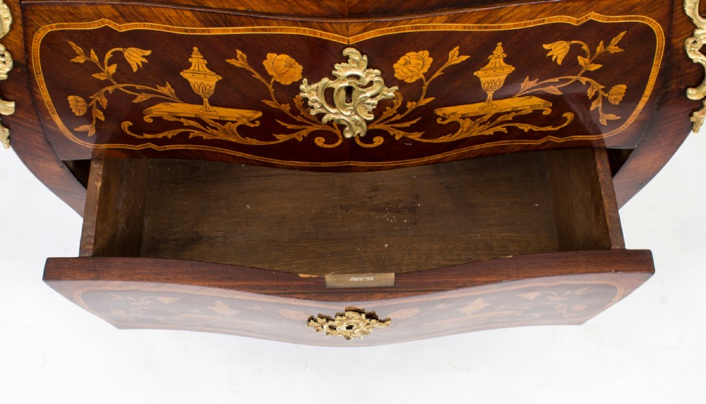 A 19th-century French Rococo Revival secretaire a abattant crafted with floral marquetry, gilt bronze mounts, a contoured silhouette, and a marble top. View XXIII